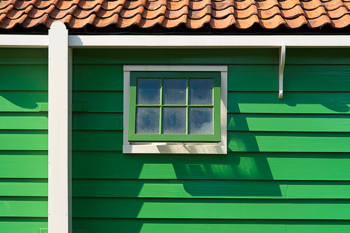 Green fiber cement siding close-up